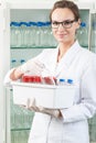 Worker of lab holding box Royalty Free Stock Photo