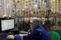 Worker in labelling workshop of food processing plant