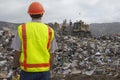 Worker At Landfill Site Royalty Free Stock Photo