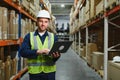 Worker with laptop computer in mail order warehouse Royalty Free Stock Photo