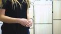 Worker Laundry girl holding fresh towels in her hands. Stock. Woman holding a towel in her hands Royalty Free Stock Photo