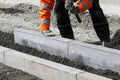 Worker laying stones