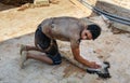 Worker in the Leather traditional tannery. Fez, Morocco Royalty Free Stock Photo