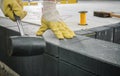 Worker Levelling Patio Concrete Floor Bricks Close Up Royalty Free Stock Photo