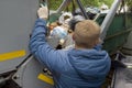 Worker loading garbage container