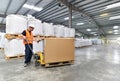 Worker in the logistics industry - scanning barcode