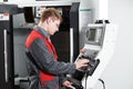 Worker at machining tool workshop