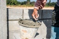 Worker make concrete wall