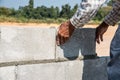 Worker make concrete wall