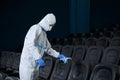 Worker making disinfection chairs against coronavirus.