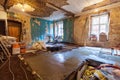 Worker is making floor from cement in the apartment during on the remodeling, renovation, extension Royalty Free Stock Photo