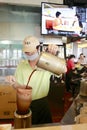 Worker making hong kong famous stockings milk tea