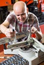 worker making nameboard