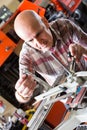 Worker making nameboard