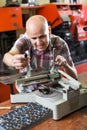 worker making nameboard