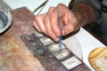 Worker making silver jewellery