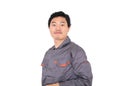 Worker making strange expressions in front of white background