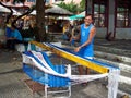 Man working building a hammock