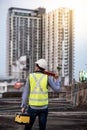 Worker man holding spirit level tool and box Royalty Free Stock Photo