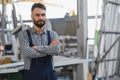 Worker measures and prepares pvc profiles in the workshop for window and door manufacturing Royalty Free Stock Photo