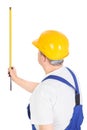 Worker with measuring tape, vertical Royalty Free Stock Photo