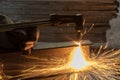 Worker metal Cutting With acetylene welding cutting torch Royalty Free Stock Photo