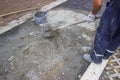 Worker Mixing concrete by hand Royalty Free Stock Photo