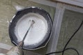 Worker mixing plaster in a bucket for alignment and putty walls of the apartment using an electric drill, close-up. Worker mixes Royalty Free Stock Photo
