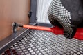 Worker is mounting metal flat pack furniture using screwdriver