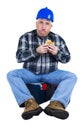 Worker with a mouthful of hamburger