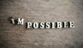 Worker moving on the word impossible to make possible