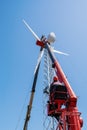 Worker operator of the aerial platform at the workplace. Installation of a wind generator