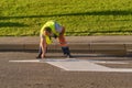 Worker paint markings on the road waiting for traffic cars - Moscow, Russia, June 18, 2020