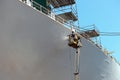 Worker painting of the ship Royalty Free Stock Photo