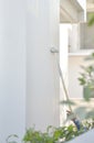 A worker is painting the walls of the house with a primer using a paint roller Royalty Free Stock Photo