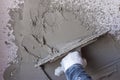 Worker performs internal plaster raw