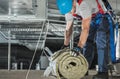 Worker with Piece of Mineral Wool Insulation Royalty Free Stock Photo