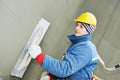 Worker at plastering facade work Royalty Free Stock Photo