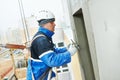 Worker at plastering facade work Royalty Free Stock Photo