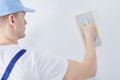 Worker with plastering trowel Royalty Free Stock Photo