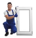 Worker with plastic window on white. Installation service Royalty Free Stock Photo