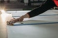 A worker prepares PVC furniture boards for packaging