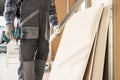 Worker Preparing to Build Another Drywall Walls Royalty Free Stock Photo