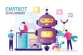 Worker programs chatbot through laptop. Development team adjusts and improves robot interface