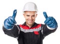 Worker in protective gloves giving thumb up