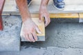 Worker puts concrete pavers 2 Royalty Free Stock Photo