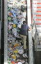 Worker at recycling plant