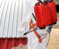 Worker during the remediation of asbestos from the roof