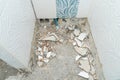 Worker remove, demolish old tiles a bathroom with jackhammer Royalty Free Stock Photo