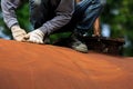 Worker is remove paint by sand paper Royalty Free Stock Photo